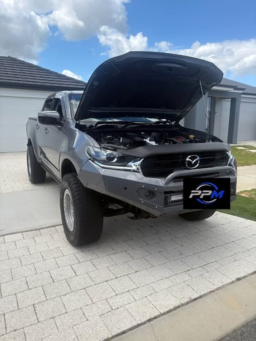Mazda BT-50 front and engine bay with the bonnet open