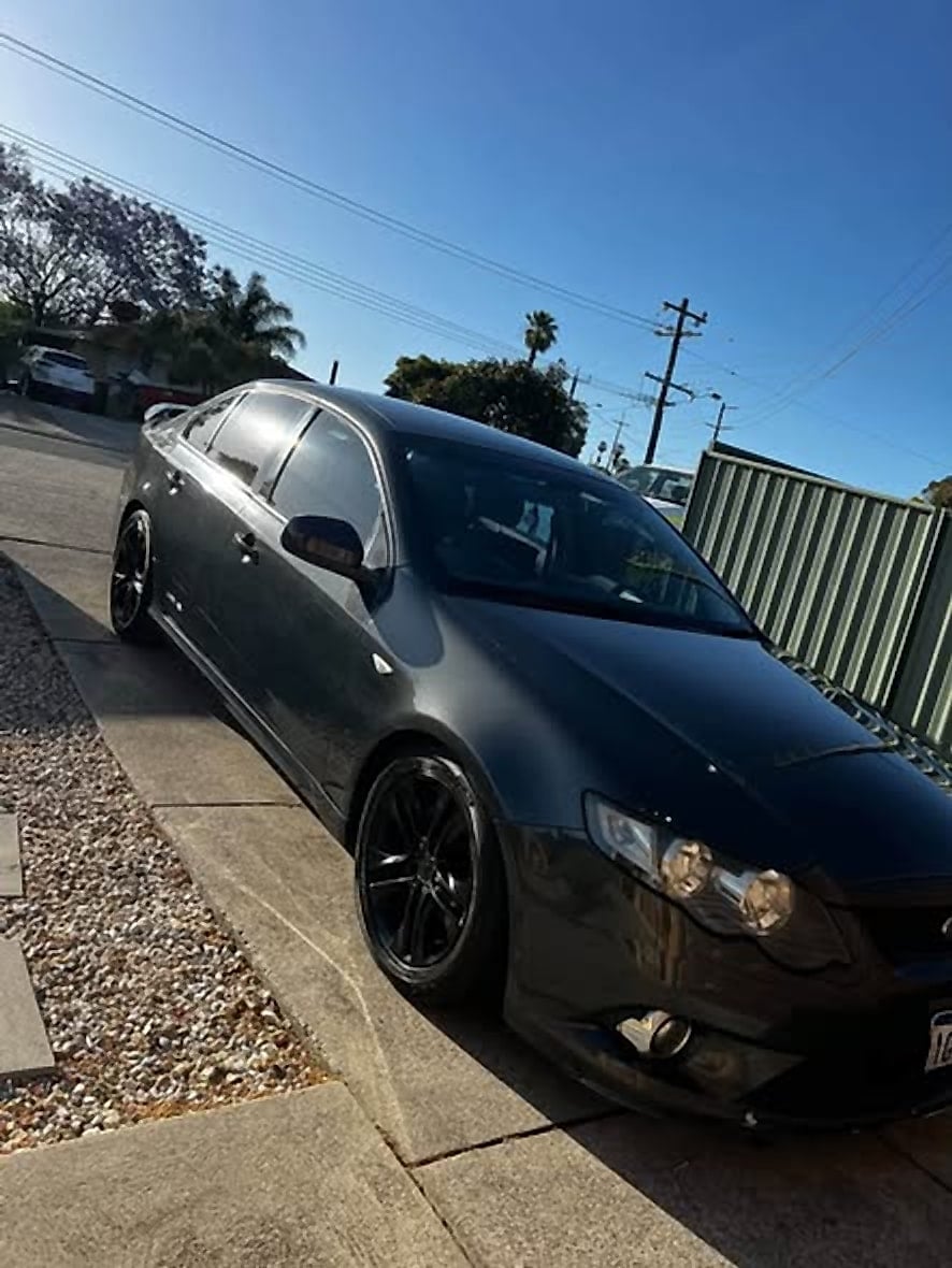 Black Ford FG Falcon XR6 sedan parked on a Perth street