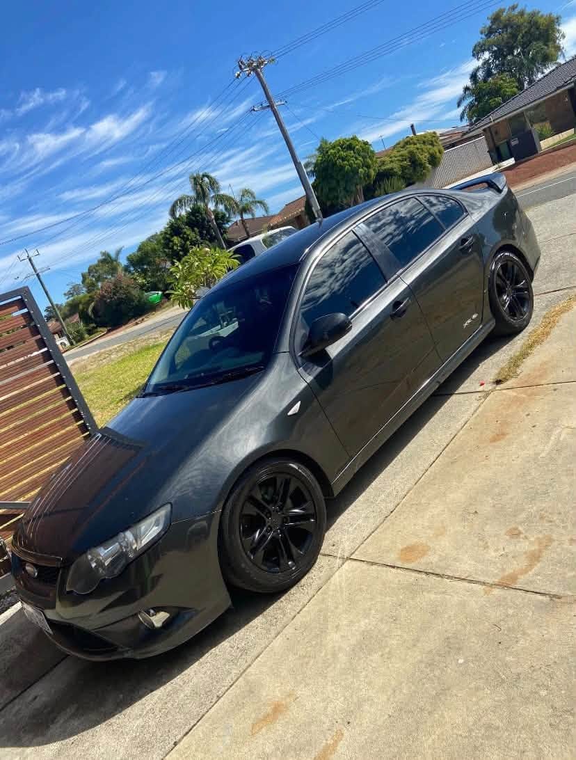 Black Ford Falcon XR6 from the front corner