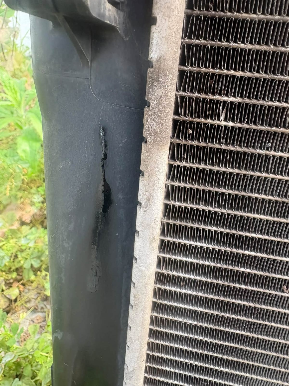 Crack in the side of the radiator tank